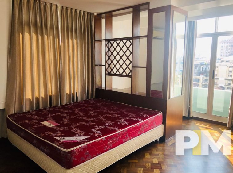 bedroom with balcony - properties in Yangon