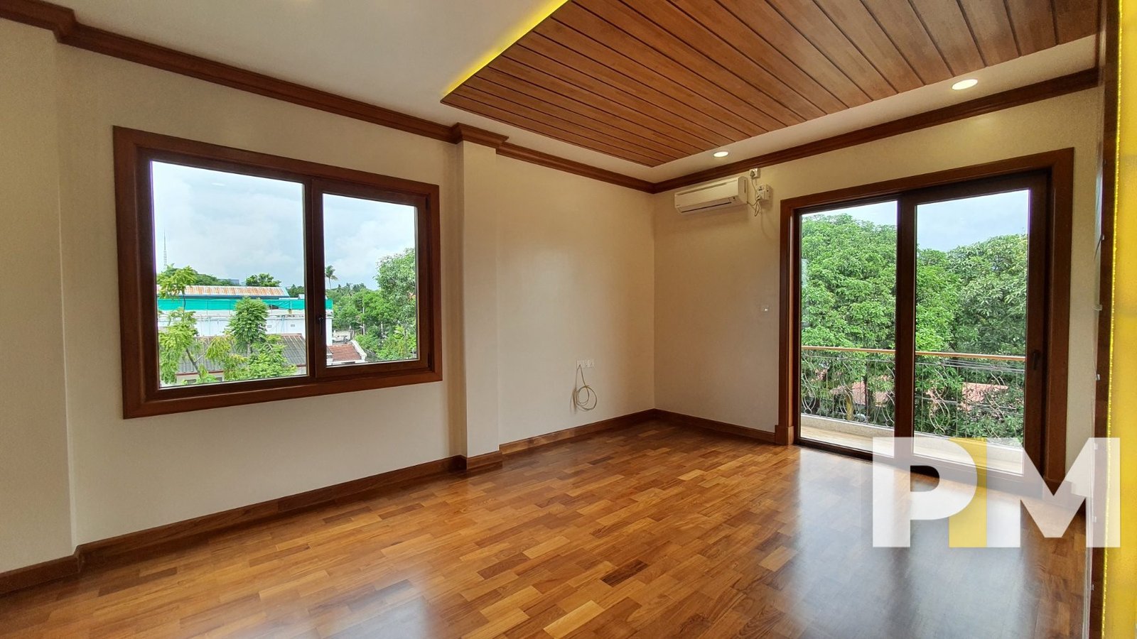 bedroom with balcony - property in Yangon