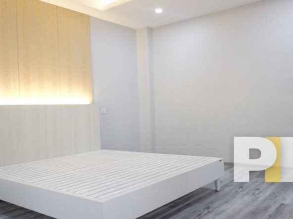 bedroom with bed - Home Rental Yangon