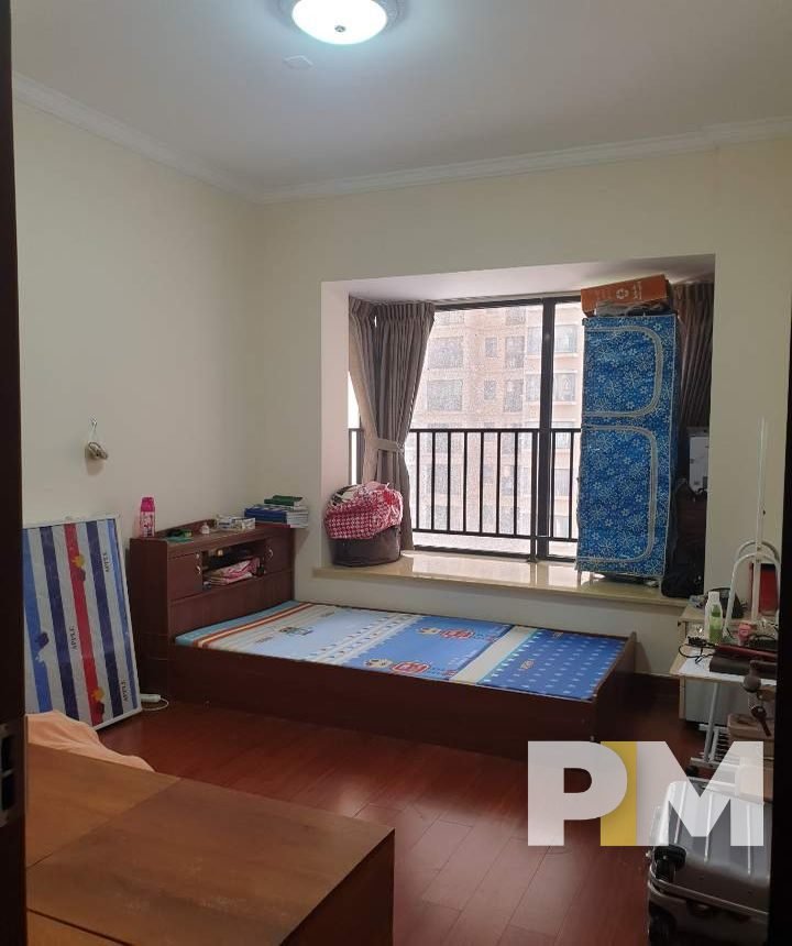 bedroom with bed - Home Rental Yangon