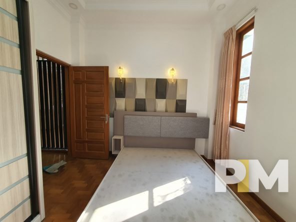 bedroom with bed - Yangon Property
