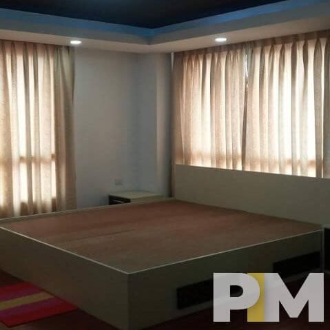 bedroom with bed - Yangon Property
