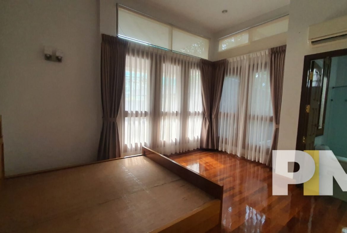 bedroom with bed - Yangon Property