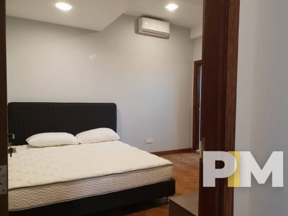 bedroom with bed and mattress - Myanmar Property
