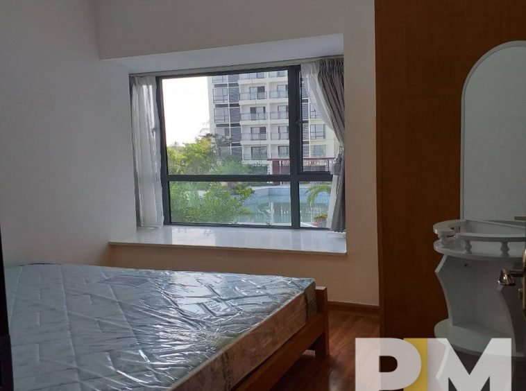 bedroom with bed and mattress - Real Estate in Yangon