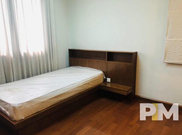 bedroom with bed and mattress - Yangon Property