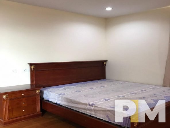bedroom with bed and mattress - Yangon Property