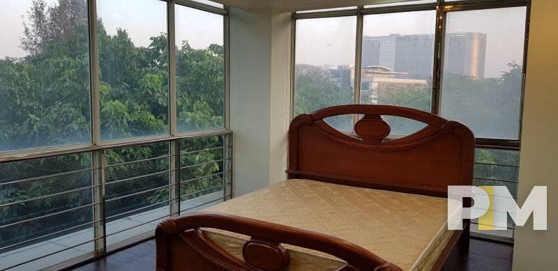 bedroom with bed and mattress - Yangon Property