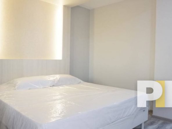 bedroom with bed and mattress - Yangon Property