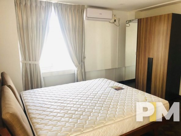bedroom with bed and mattress - Yangon Property for sale
