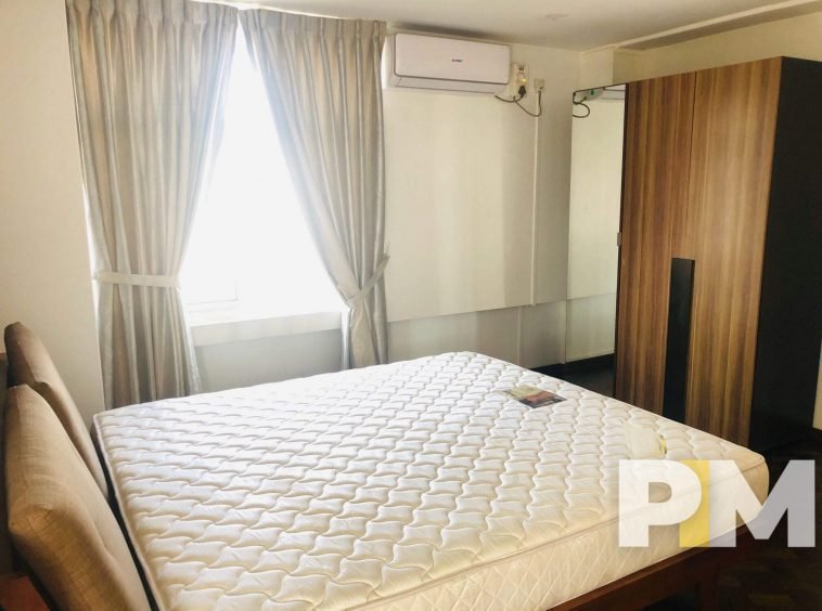 bedroom with bed and mattress - Yangon Property for sale