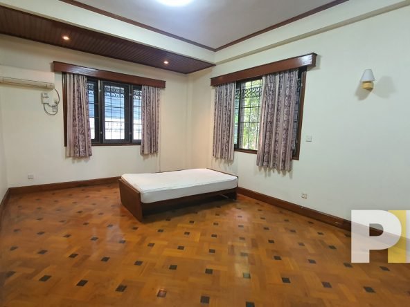 bedroom with bed and mattress - Yangon Property