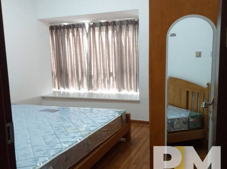 bedroom with bed and mattress - Yangon Real Estate