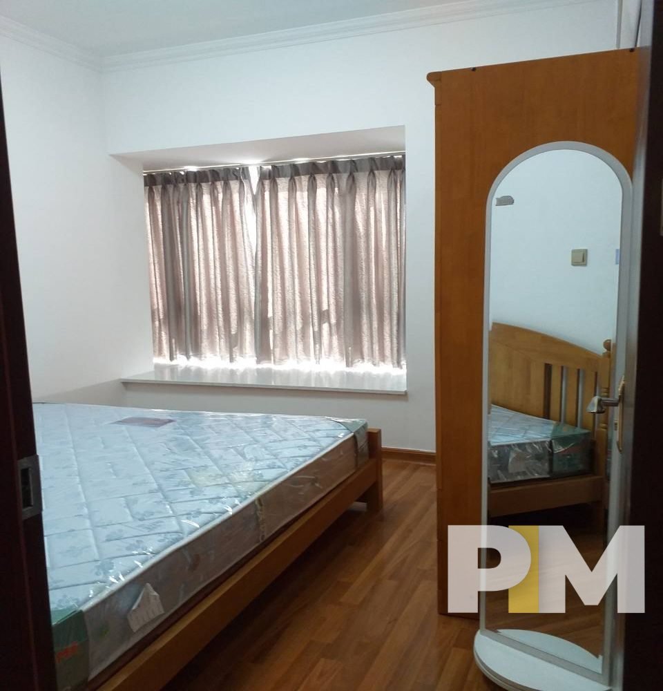 bedroom with bed and mattress - Yangon Real Estate