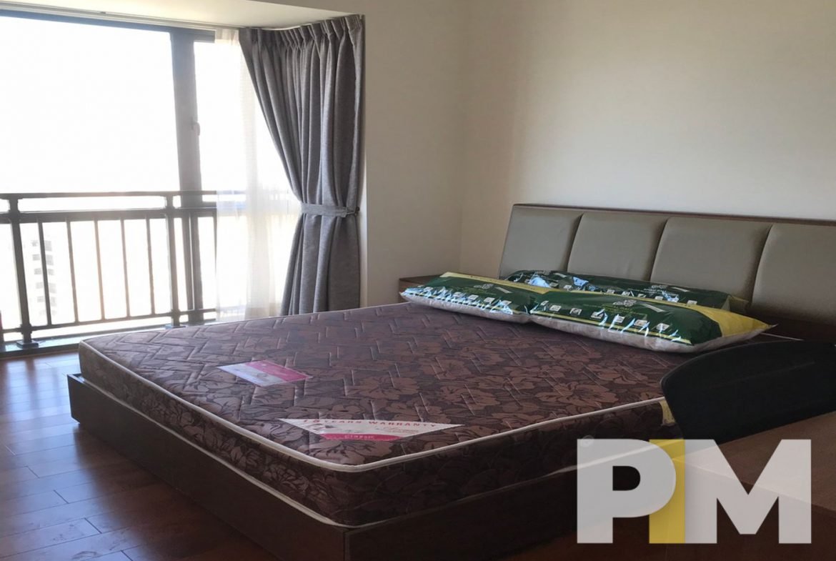 bedroom with bed and mattress - Yangon Real Estate
