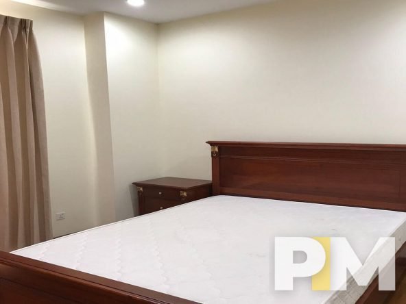 bedroom with bed and mattress - Yangon Real Estate