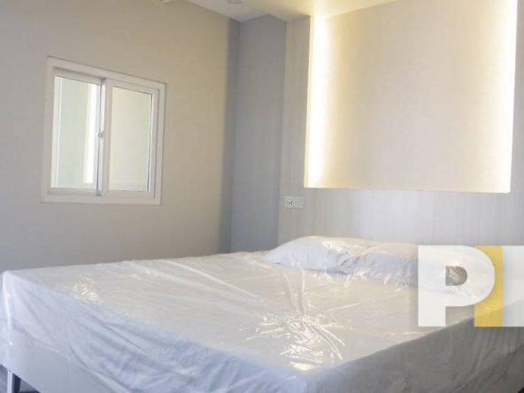 bedroom with bed and mattress - Yangon Real Estate