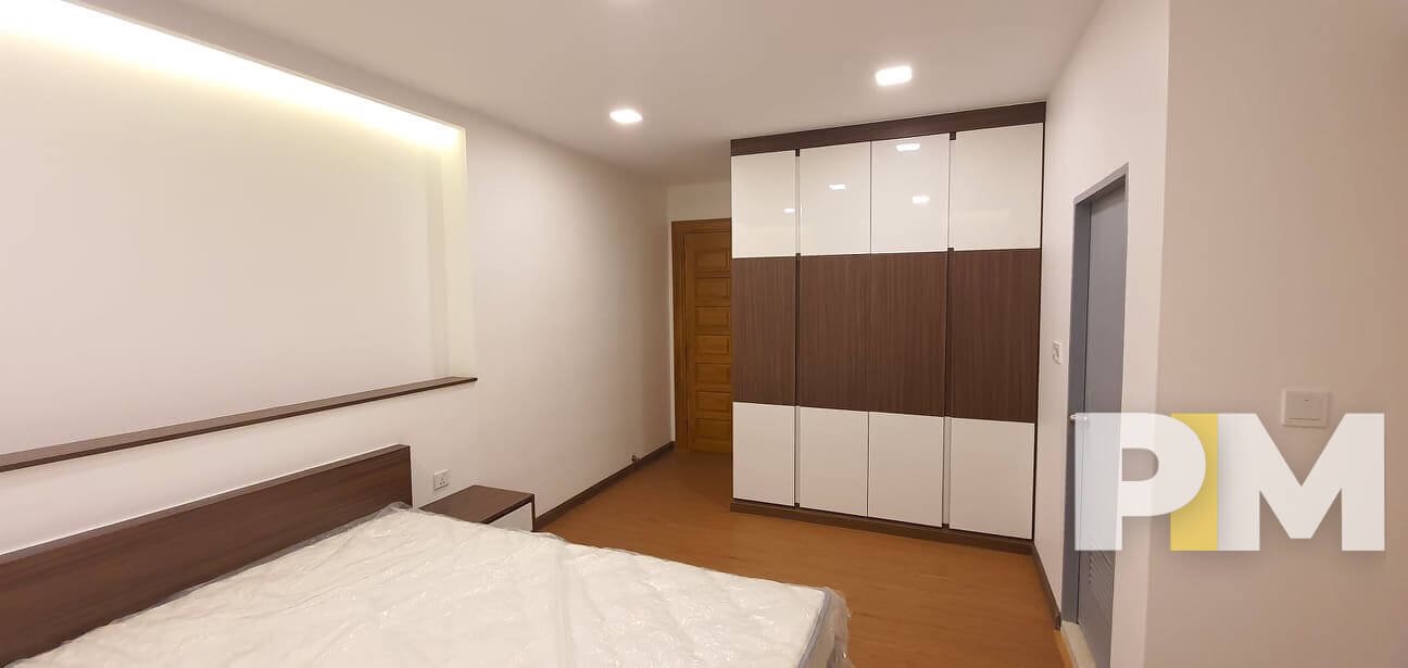 bedroom with bed and mattress - Yangon Real Estate