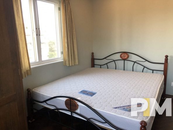 bedroom with bed and mattress - Yangon Real Estate