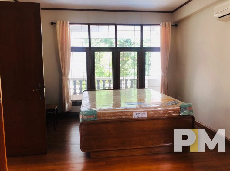 bedroom with bed and mattress - properties in Yangon