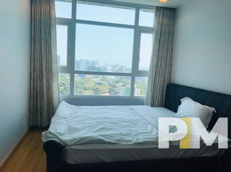 bedroom with bed and mattress - properties in Yangon