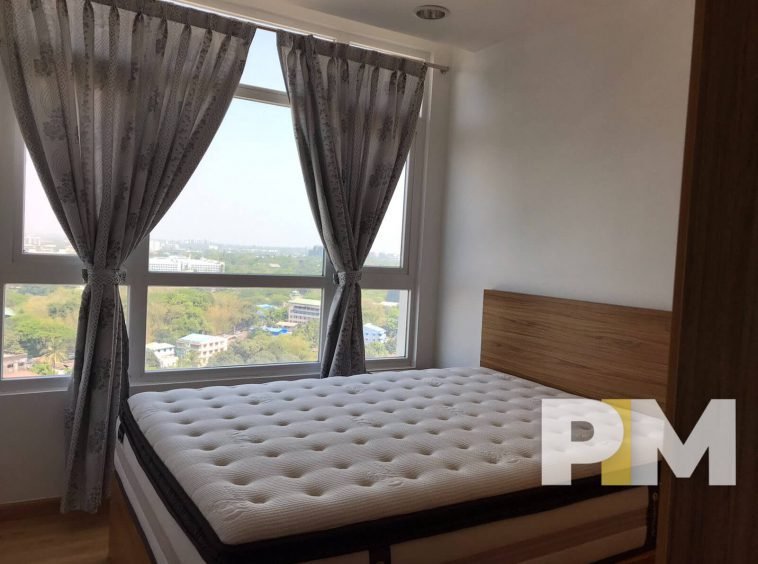 bedroom with bed and mattress - properties in Yangon