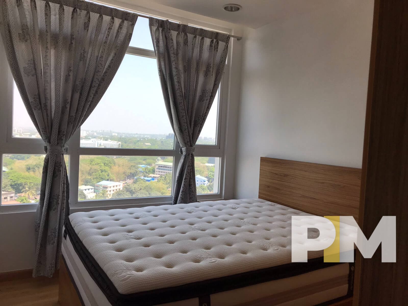 bedroom with bed and mattress - properties in Yangon