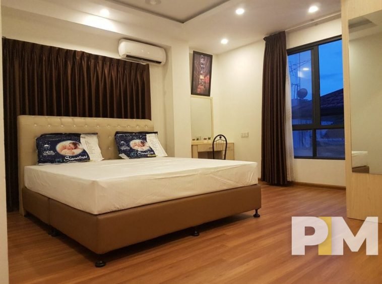 bedroom with bed and mattress - properties in Yangon