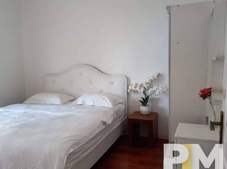 bedroom with bed and mattress - property in Yangon