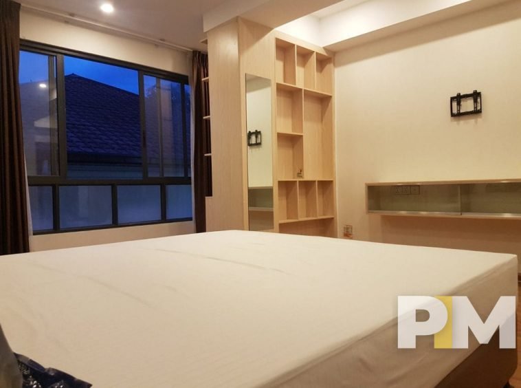 bedroom with bed and mattress - property in Yangon