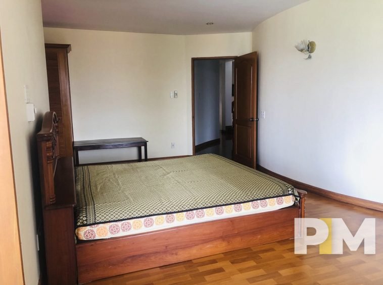 bedroom with bed and mattress - property in Yangon