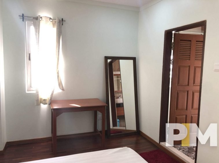 bedroom with body mirror - Yangon Real Estate