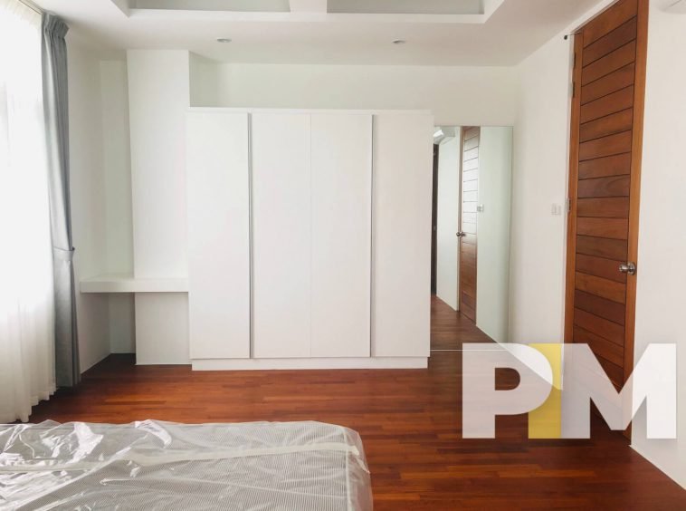 bedroom with closet - Real Estate in Yangon