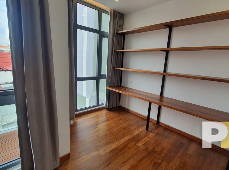 bedroom with shelf - property in Yangon