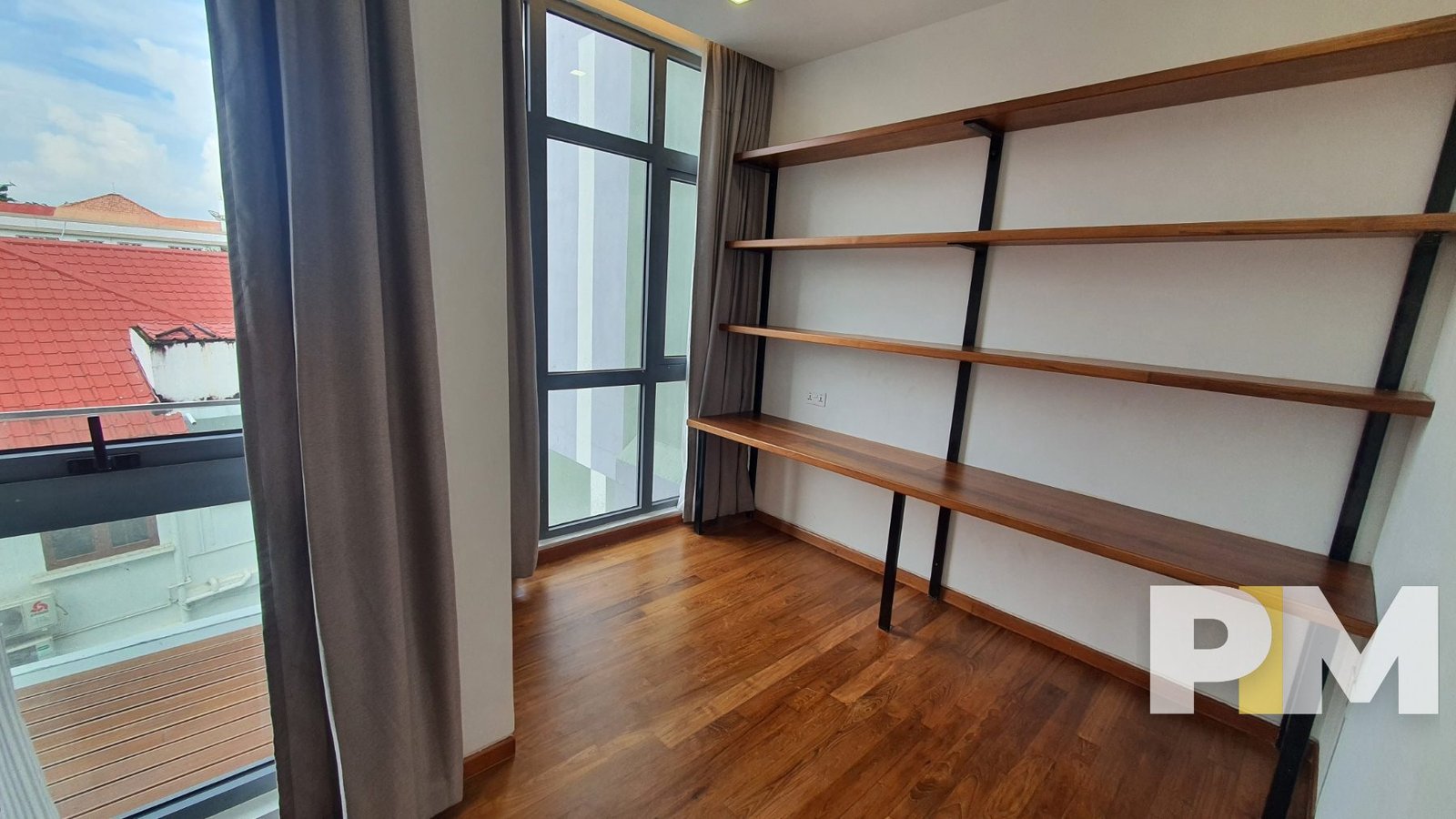 bedroom with shelf - property in Yangon