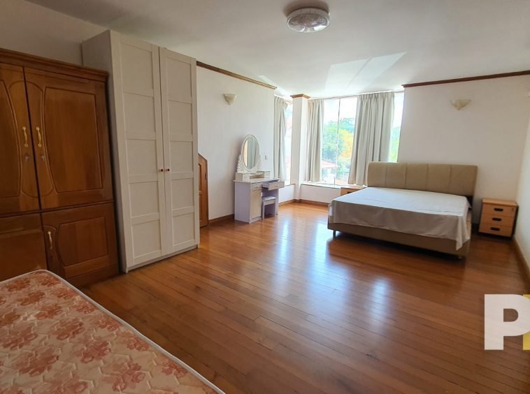bedroom with vanity mirror - property in Yangon