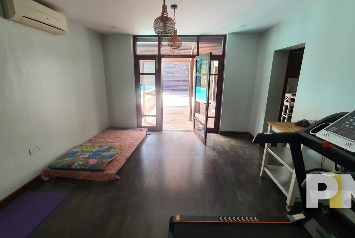 bedroom with walking machine - properties in Yangon