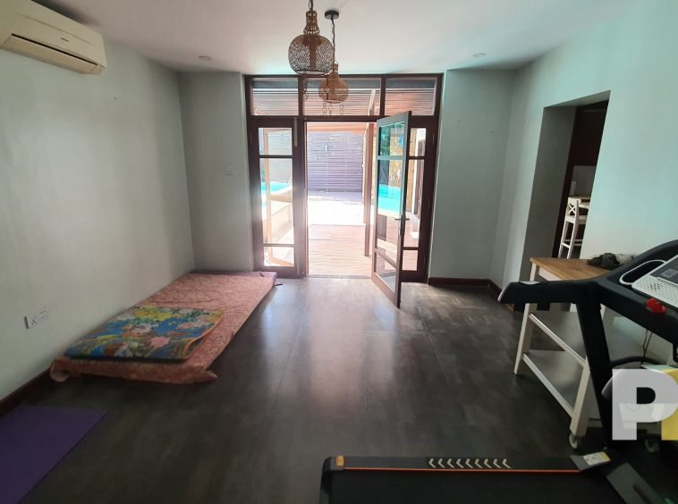 bedroom with walking machine - properties in Yangon