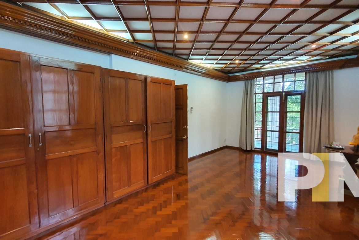 bedroom with wardrobe - Home Rental Yangon