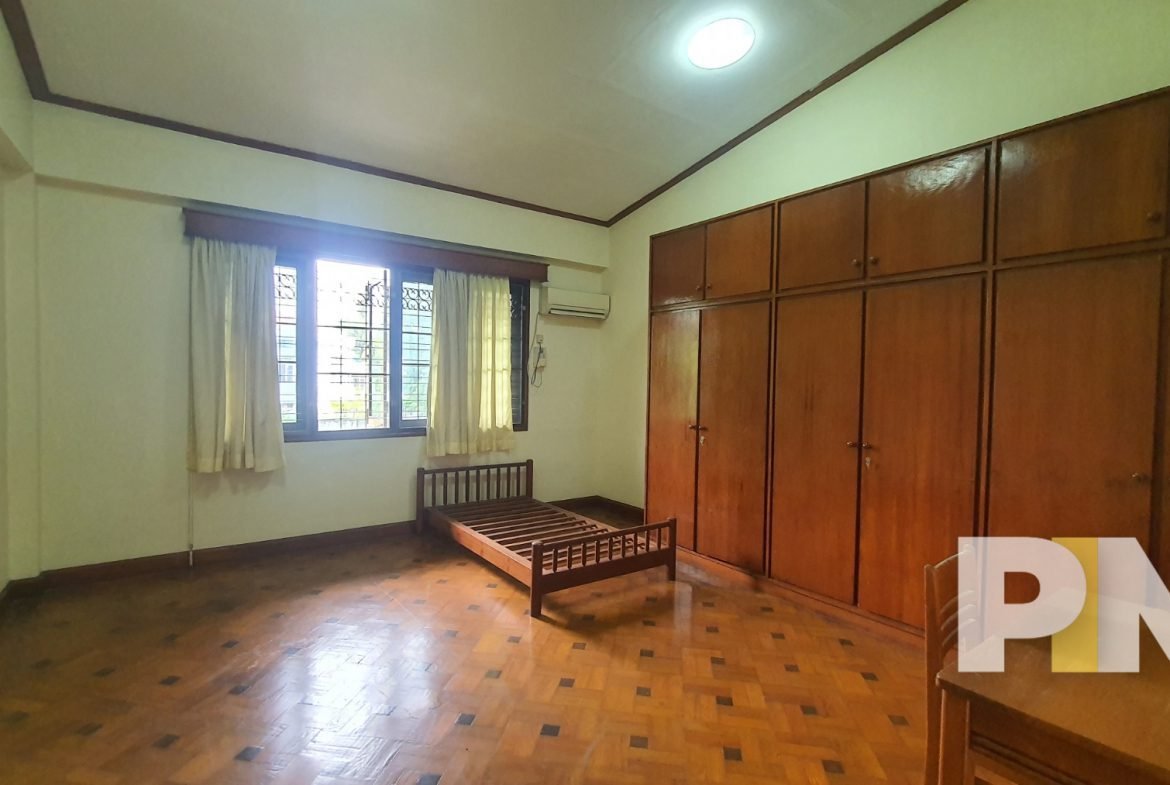 bedroom with wardrobe - Home Rental Yangon