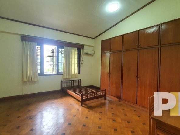 bedroom with wardrobe - Home Rental Yangon