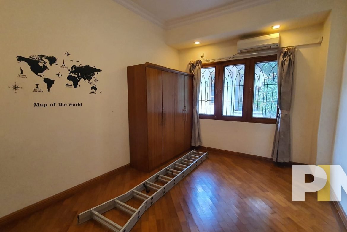 bedroom with wardrobe - Home Rental Yangon