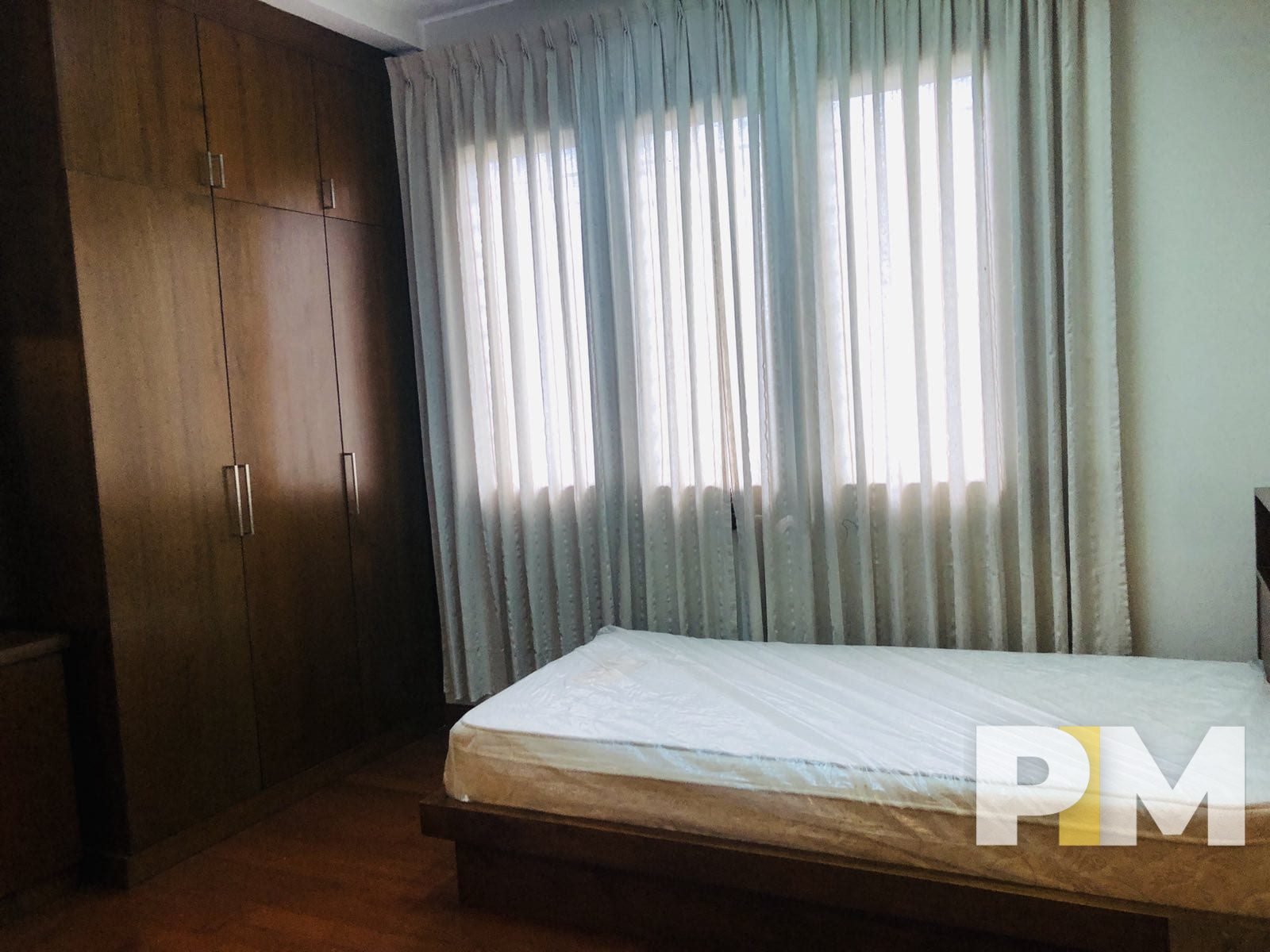 bedroom with wardrobe - Home Rental Yangon