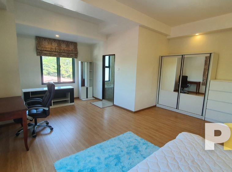 bedroom with wardrobe - Home Rental Yangon