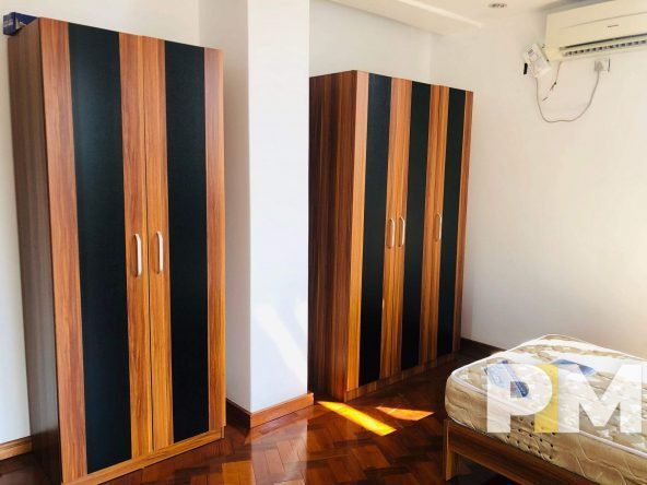 bedroom with wardrobe - Home Rental Yangon