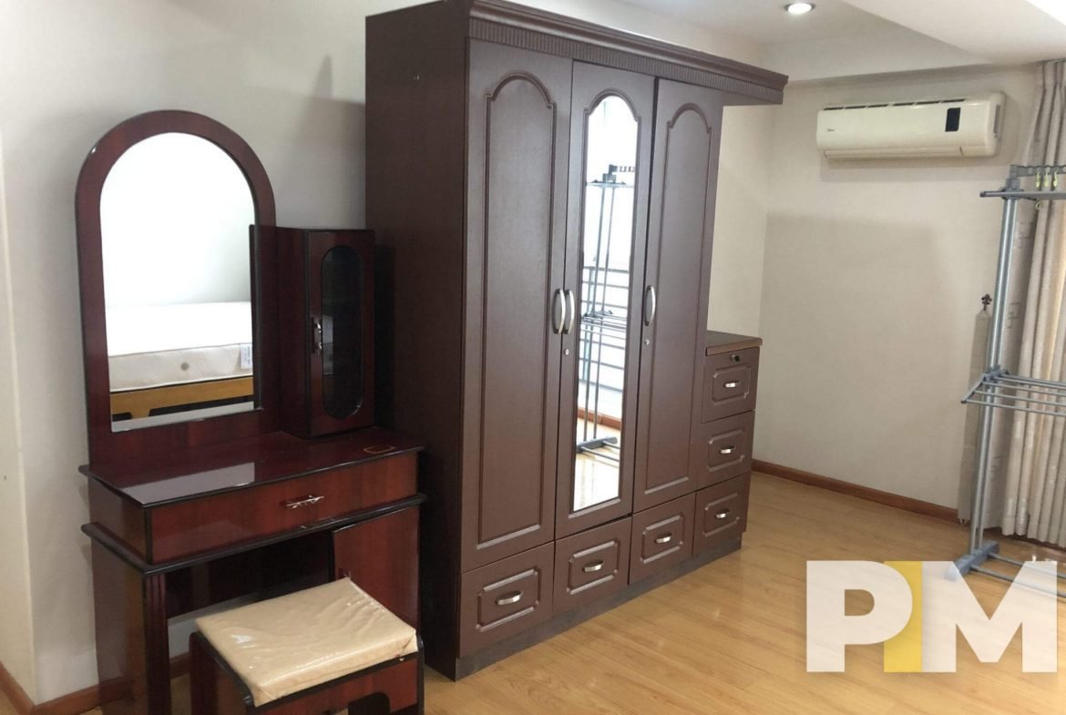 bedroom with wardrobe - properties in Myanmar