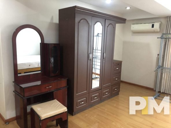 bedroom with wardrobe - properties in Myanmar