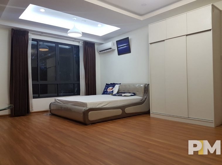 bedroom with wardrobe - properties in Yangon