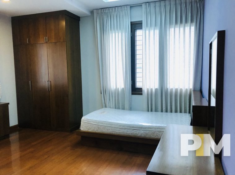 bedroom with wardrobe - properties in Yangon