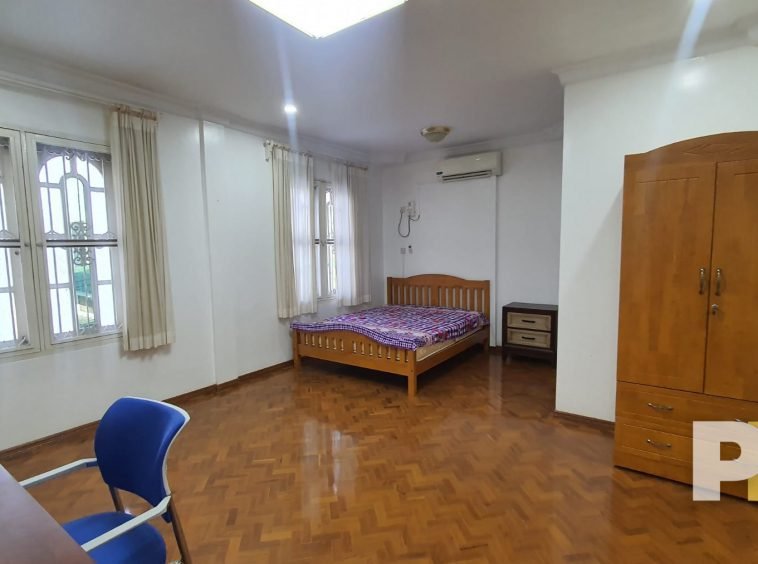 bedroom with wardrobe - property in Yangon